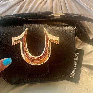 True Religion black and gold purse